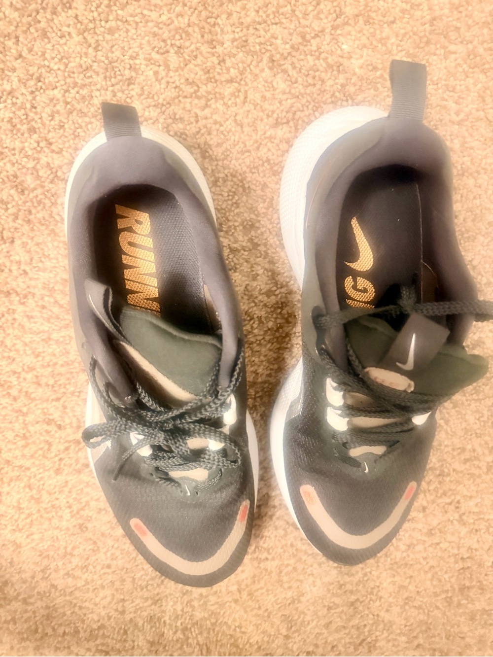 Nike Black Running Sneakers with White Soles and Pink Accents